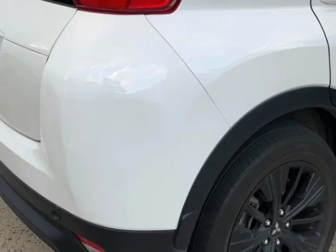 Professional car repair result - Bumper Dent Repair after expert repair by Melbourne Scratch Repairs