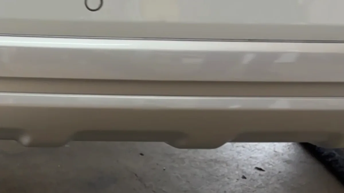 Audi rear bumper scratch repaired in Epping — after