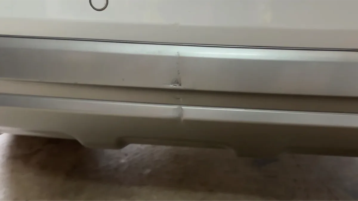 Audi rear bumper scratch repaired in Epping — before