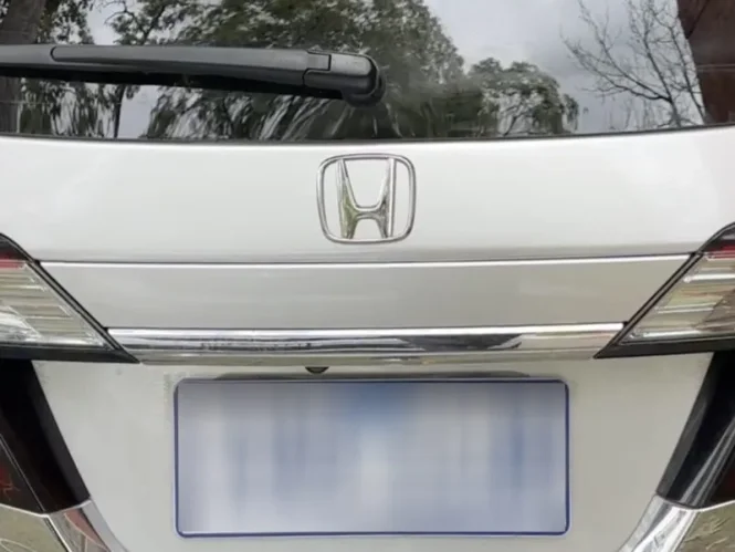 Professional car repair result - Tailgate Dent Repair after expert repair by Melbourne Scratch Repairs