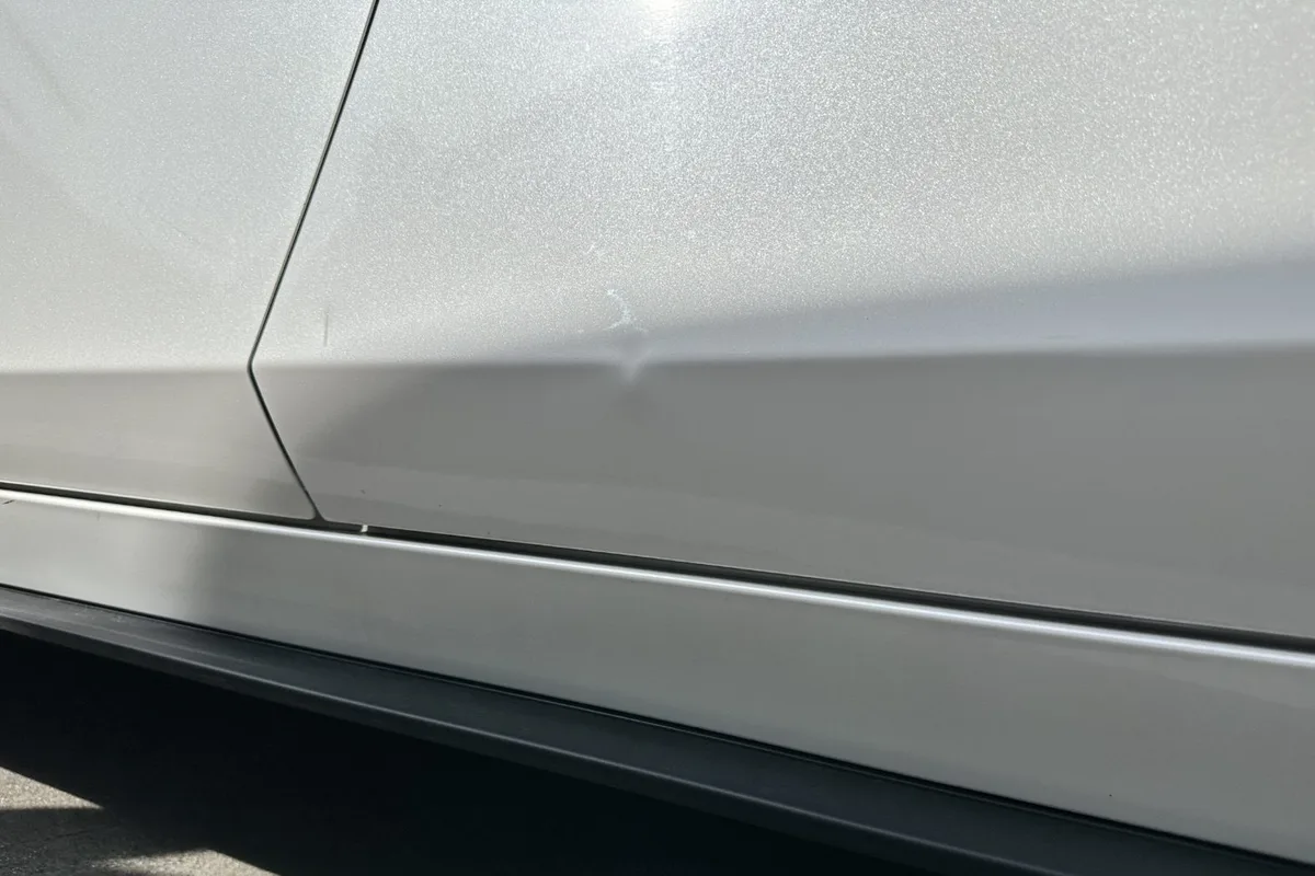 Car damage before repair - Door Crease Dent Repair before professional scratch repair service