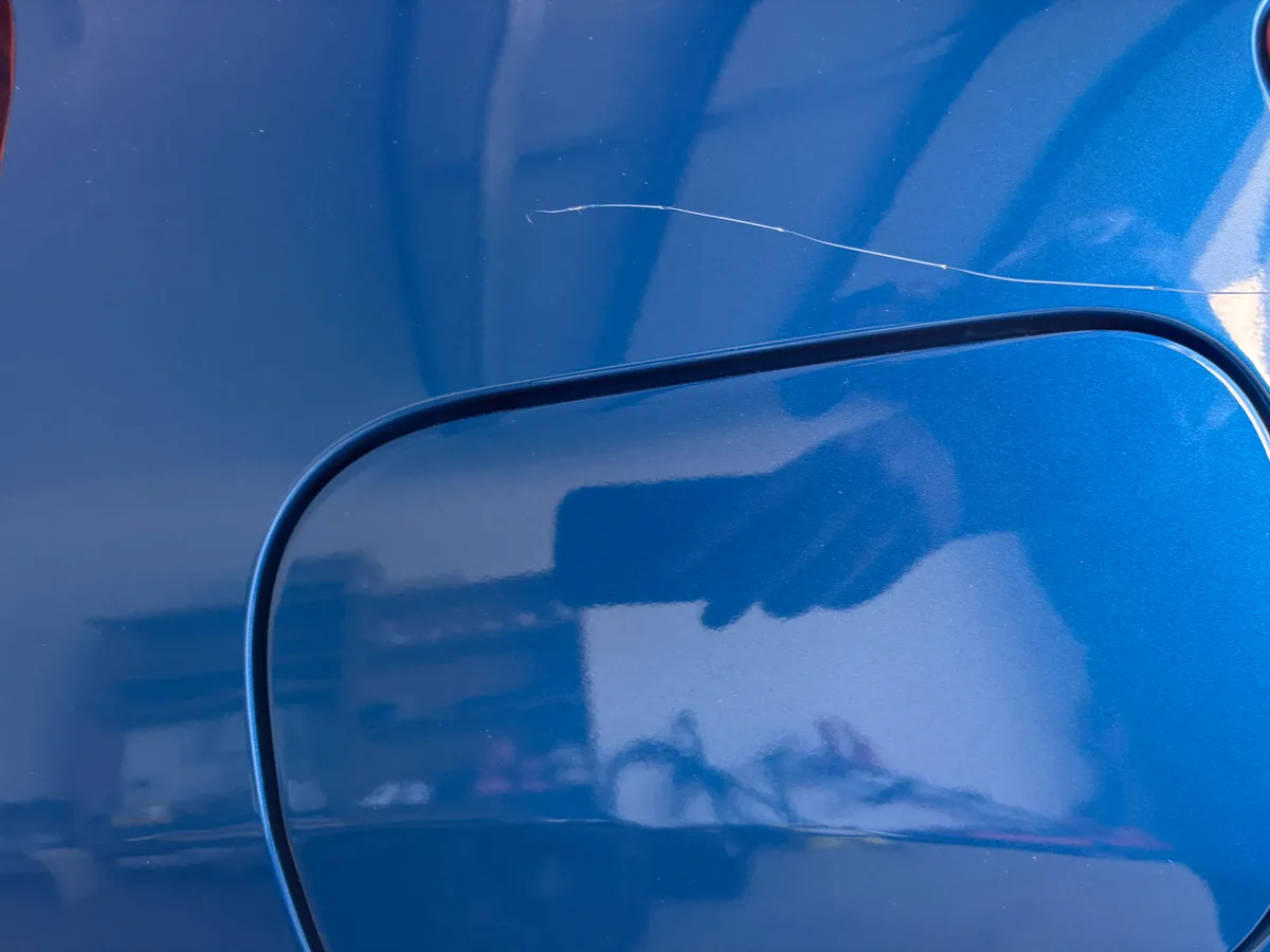 Car damage before repair - Keyed Car Repair before professional scratch repair service