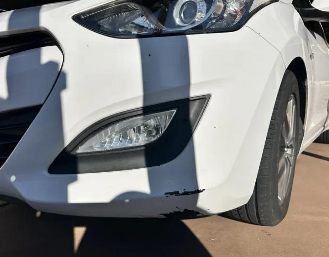 Car damage before repair - Bumper Paint Chip Repair before professional scratch repair service