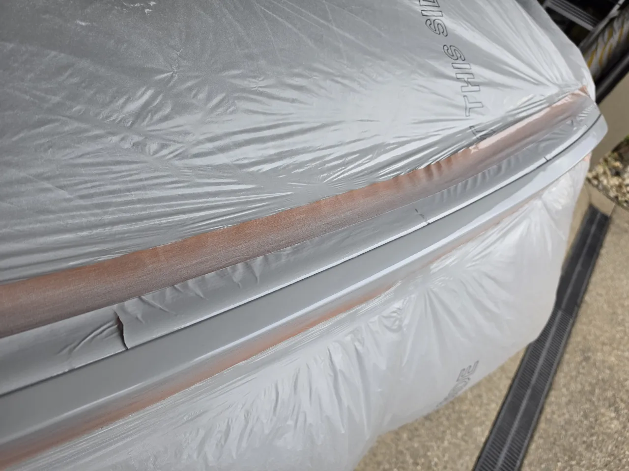 Lexus LS460 spoiler freshly painted in Glacier Frost Mica code 074