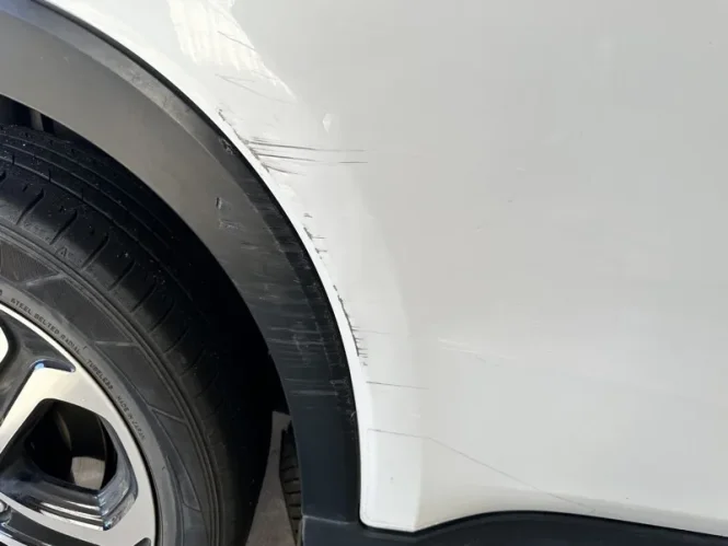 Car damage before repair - Door and Wheel Arch Repair before professional scratch repair service